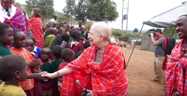 Ms. Judy with children abroad