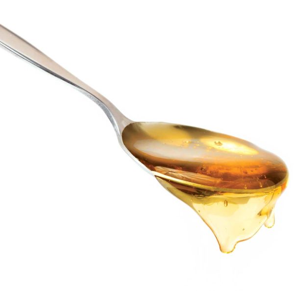 Oregano Honey on spoon