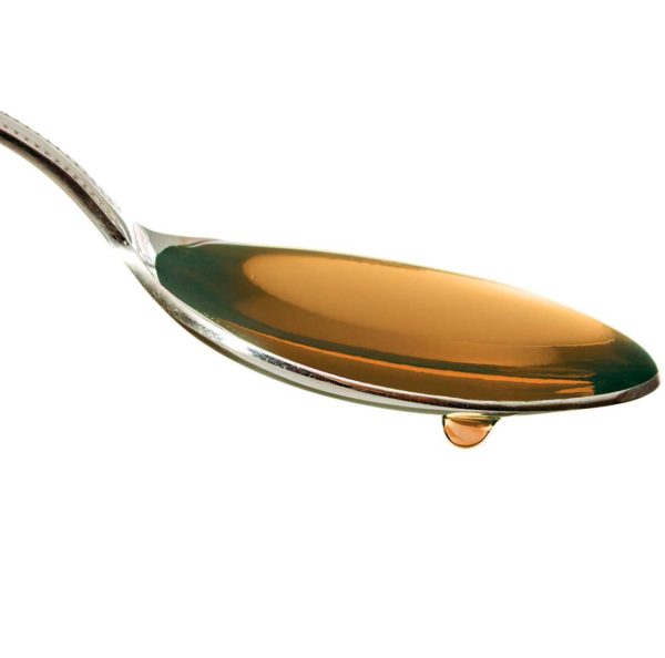 PomaMax liquid on a spoon