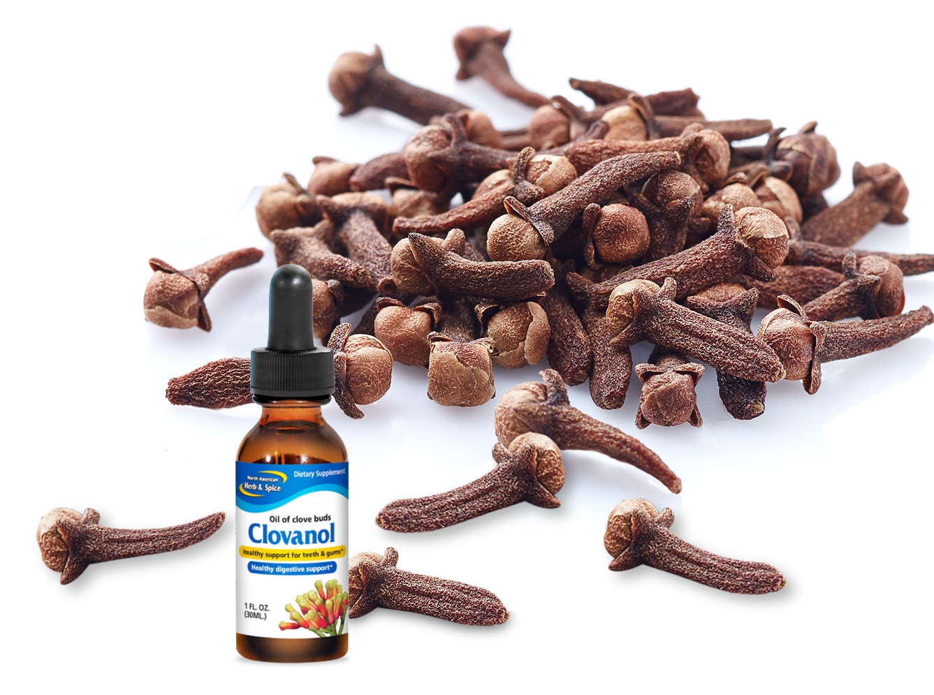 Raw cloves with Clovanol bottle